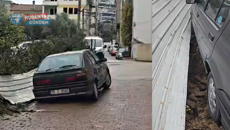 Güzelyalı’da yol çöktü, park halindeki araç askıda kaldı!